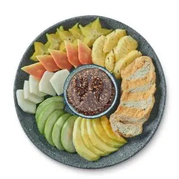 Rujak Manis Ambon — Bumbu manis khas Ambon dengan potongan buah pilihan.
